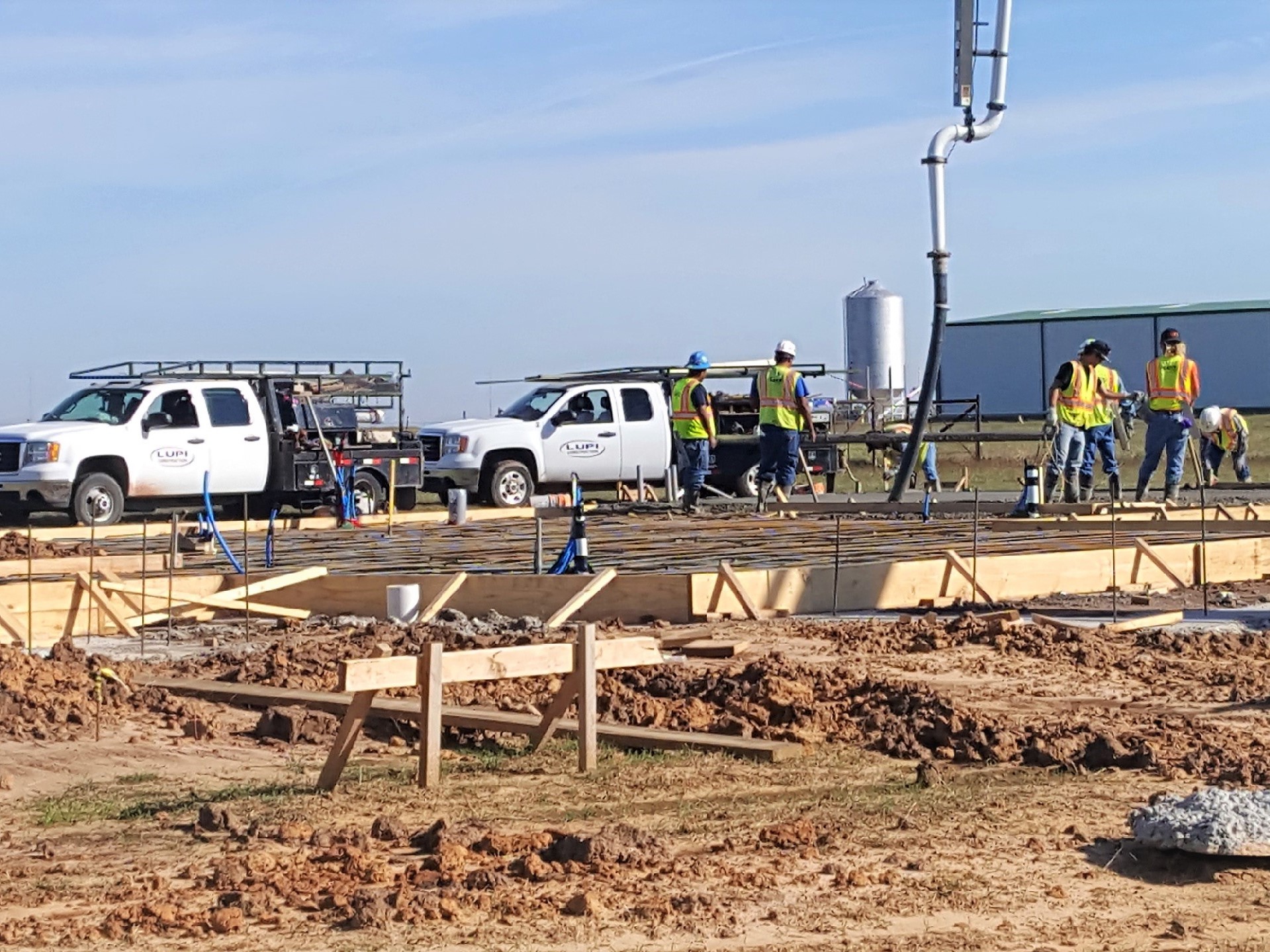 Crew placing concrete for a commercial building foundation in Southwest Oklahoma