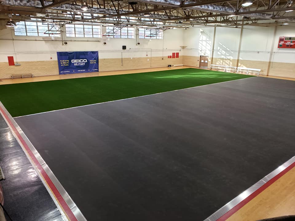 Indoor athletic training facility with synthetic turf field installation near Fort Sill, Oklahoma